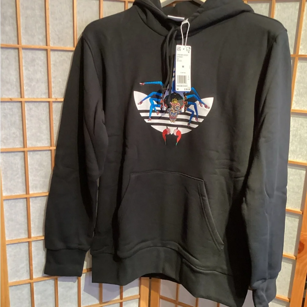 adidas sweatshirt featuring